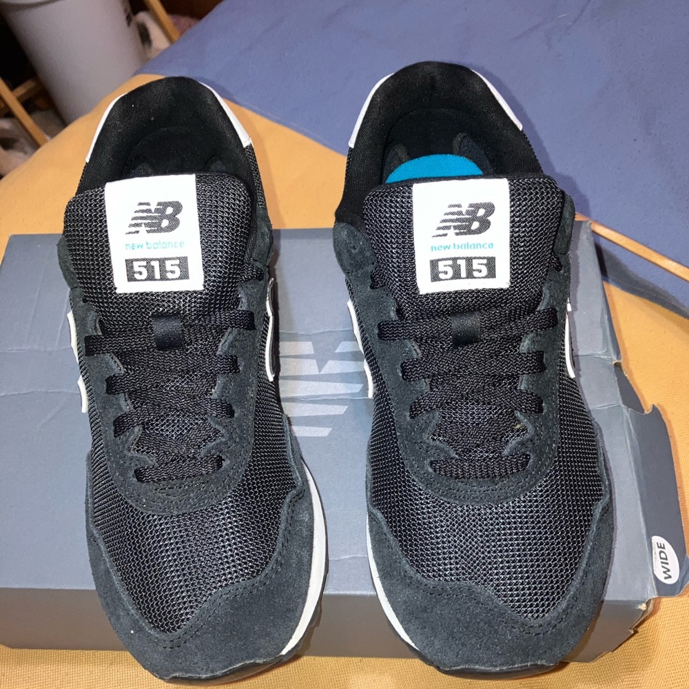 Black and white women’s New Balance in UEC